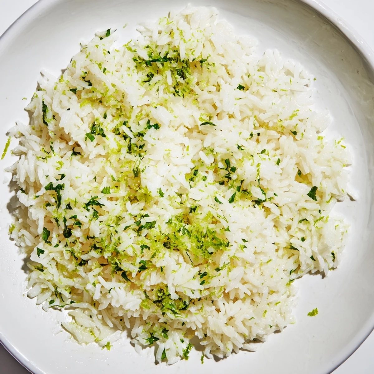 Steaming Cilantro Lime Rice, a bright and flavorful side dish, ready to complement your tacos.