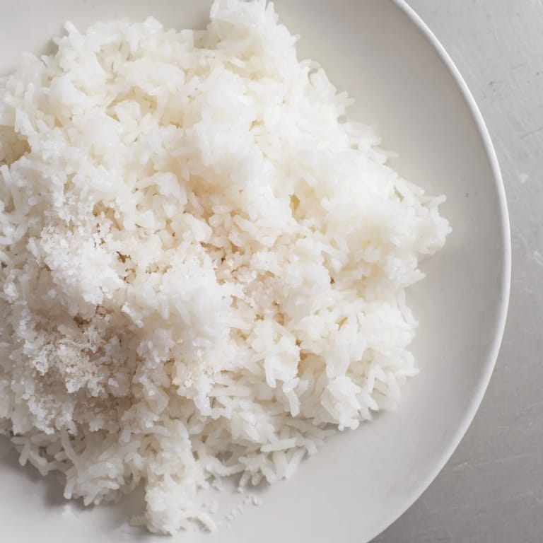 Aromatic, tender Coconut Jasmine Rice, perfect for scooping up alongside flavorful curries tonight.